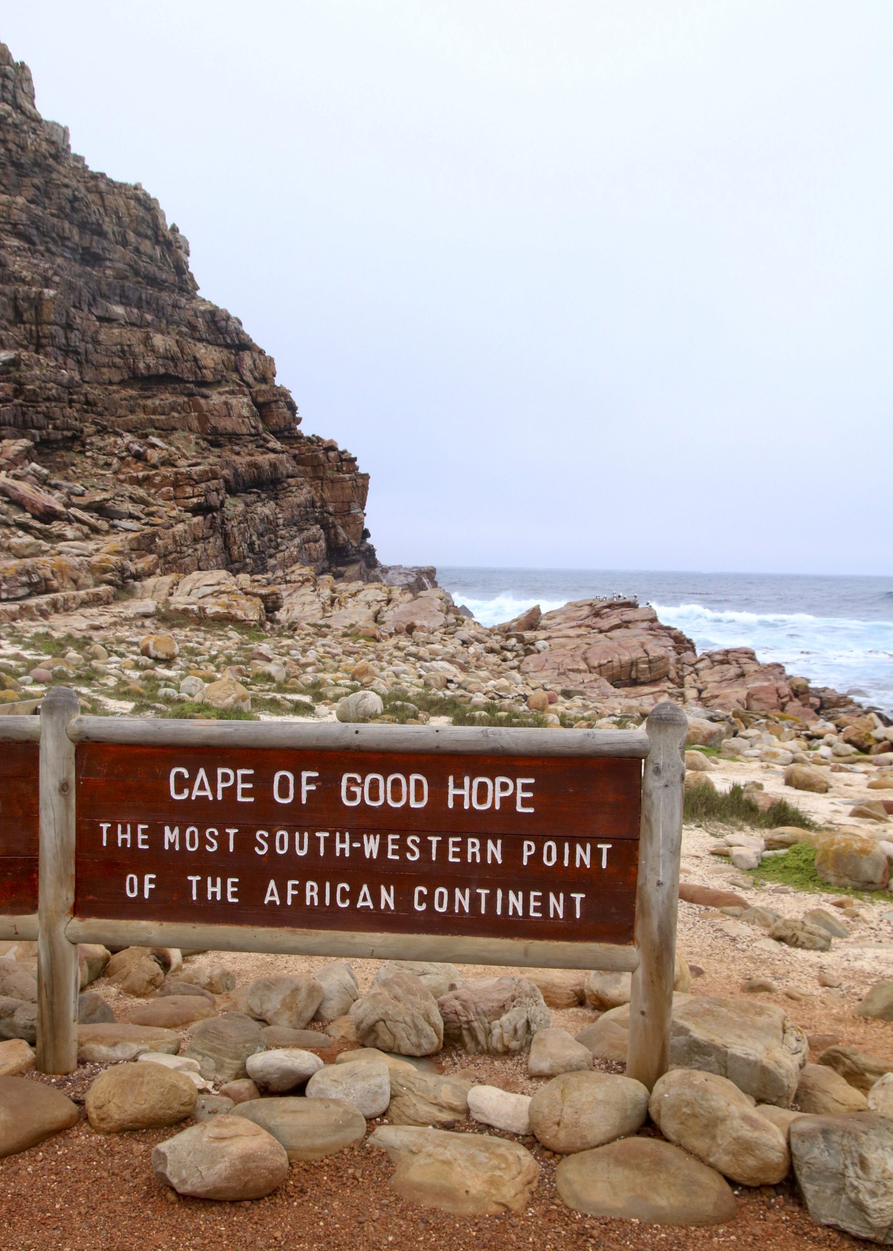 rocky coast with signboard "Cape of Good Hope"