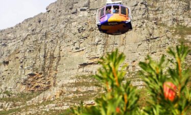 Table Mountain cable car with mountain in the back